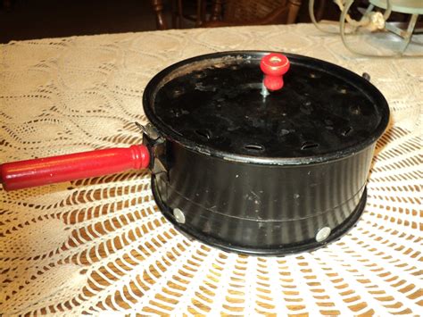 1980s popcorn popper|vintage cast iron popcorn popper.